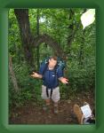 AmicalolaToUnicoi 020 * Chris standing in front of a wierd tree that grew out of the ground in two different spots, chris ended up getting stung in this picture * 1200 x 1600 * (880KB)